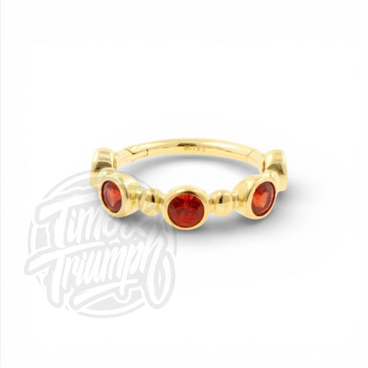 18k Gold Red Songea Sapphires Clicker - Time and Trimph